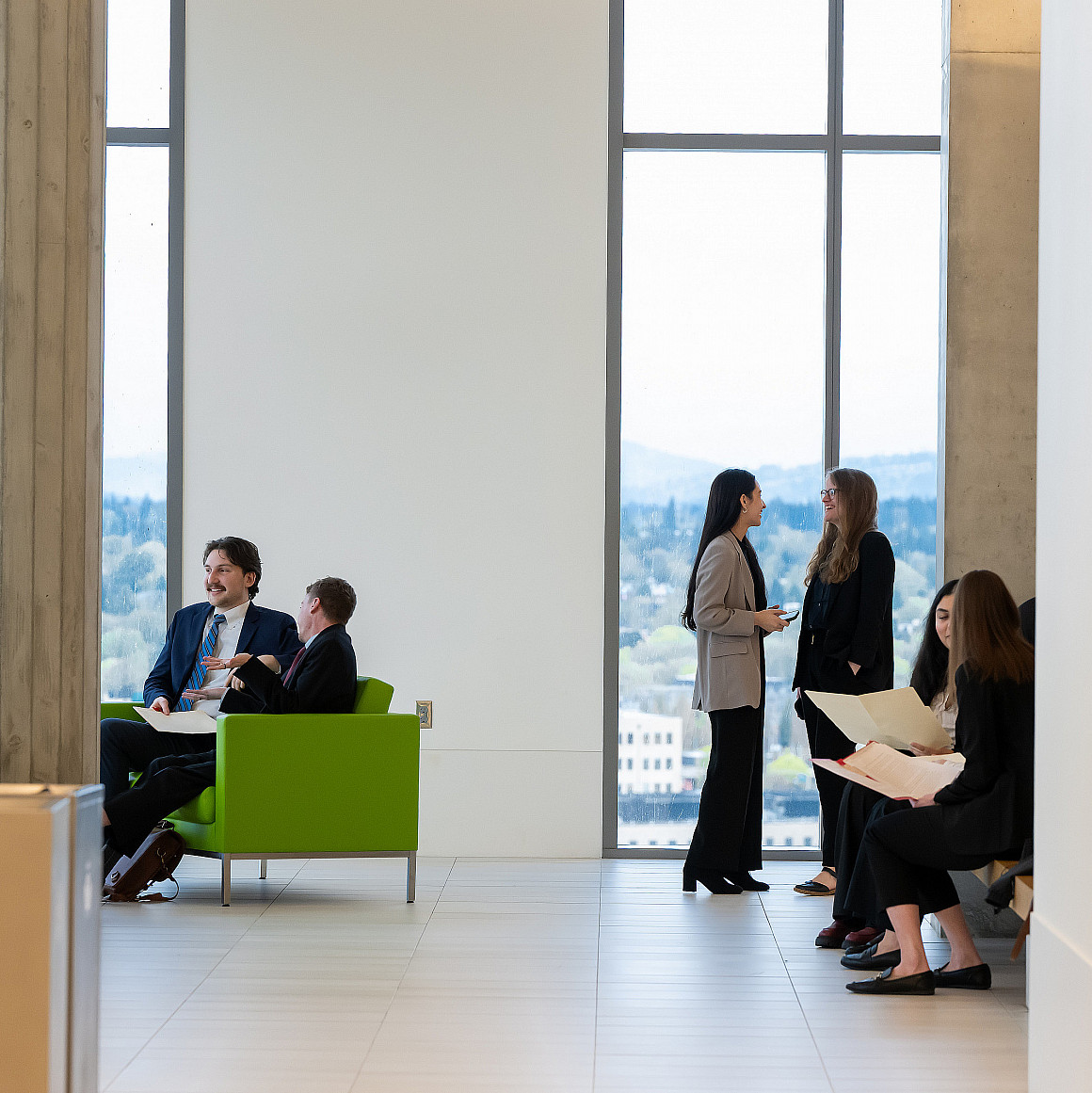 Students preparing to enter courtrooms for their 1L Oral Arguments