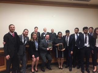 The Jessup International Moot Court team celebrates after a successful run at Regionals.