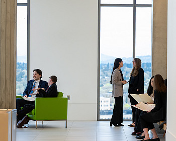Students preparing to enter courtrooms for their 1L Oral Arguments