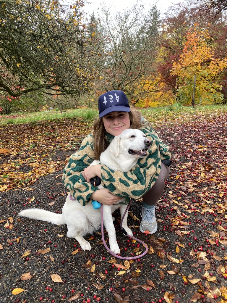 Teaching Fellow Maddy Masaryk with dog.