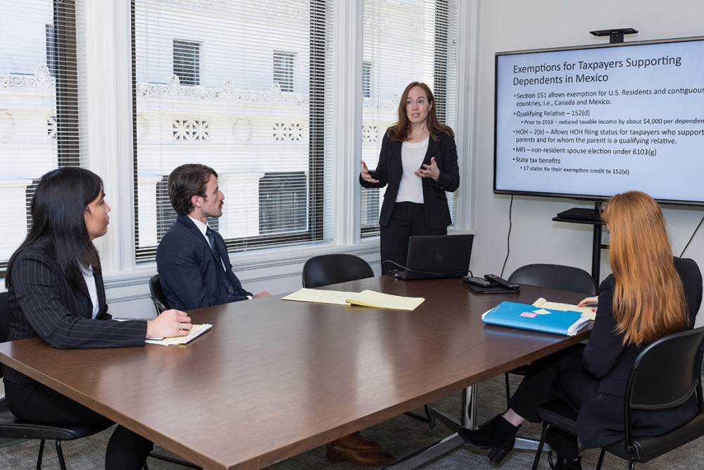 A teaching moment (LtoR) Bree Yamada '24, Tanner Baloh '24, Professor Sarah Lora (LITC director), and Meg Jones '24.