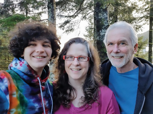 Mary (Molly) Mulvaney '93 practices law and mediation in Cordova, Alaska. Pictured with her are her son, Sullivan Mulvaney, and her husba...
