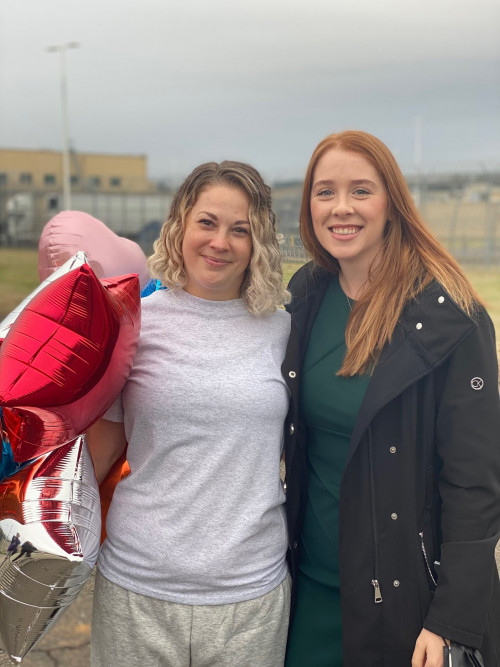 Former clinic student Stacie Damazo meeting her client outside Coffee Creek Correctional Facility at her release.