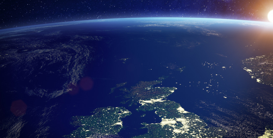 United Kingdom (UK) from space at night with city lights of the City of London, England, Wales, Scotland, Northern Ireland, communication...